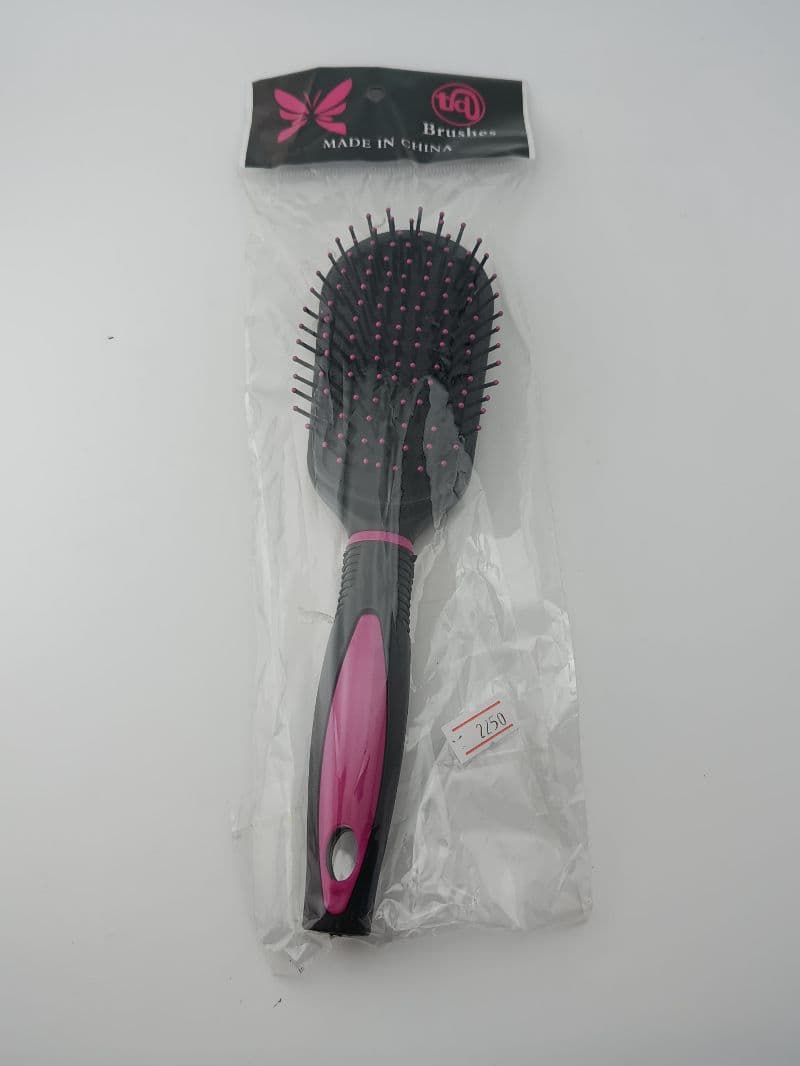 Cepillo de plástico para cabello negro con rosado