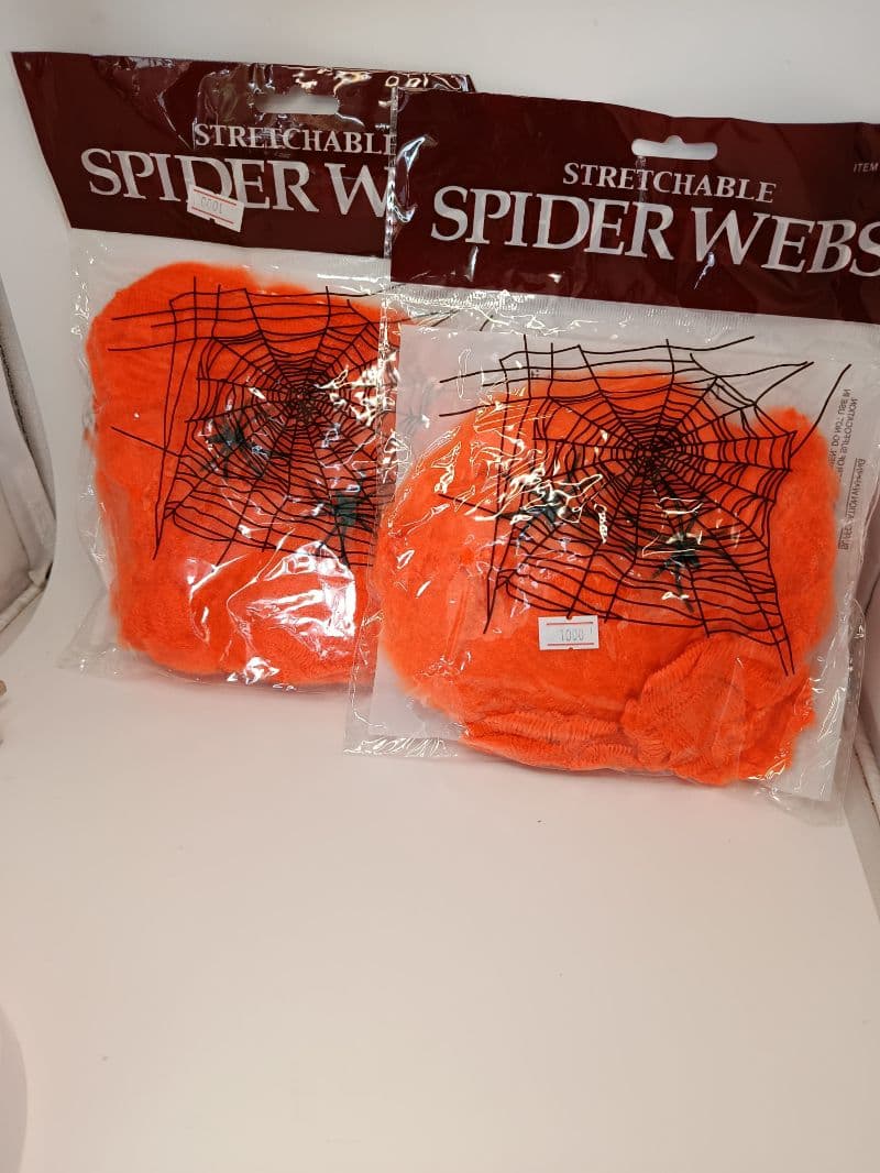 Telaraña decorativa elástica naranja con arañas