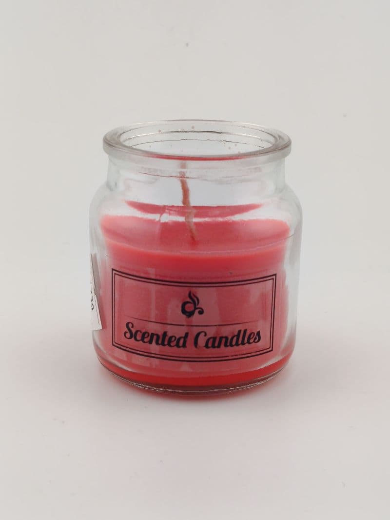 Vela aromática en frasco de vidrio