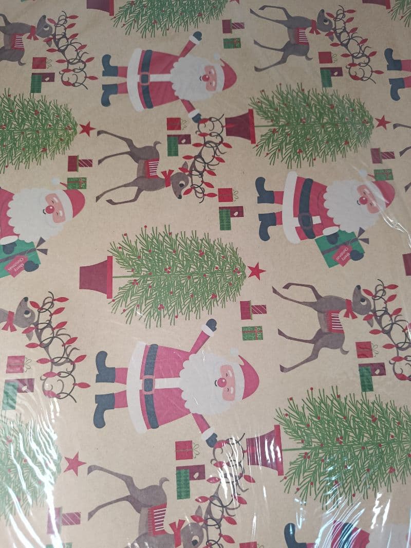 Papel kraft navideño con diseño de Santa y renos