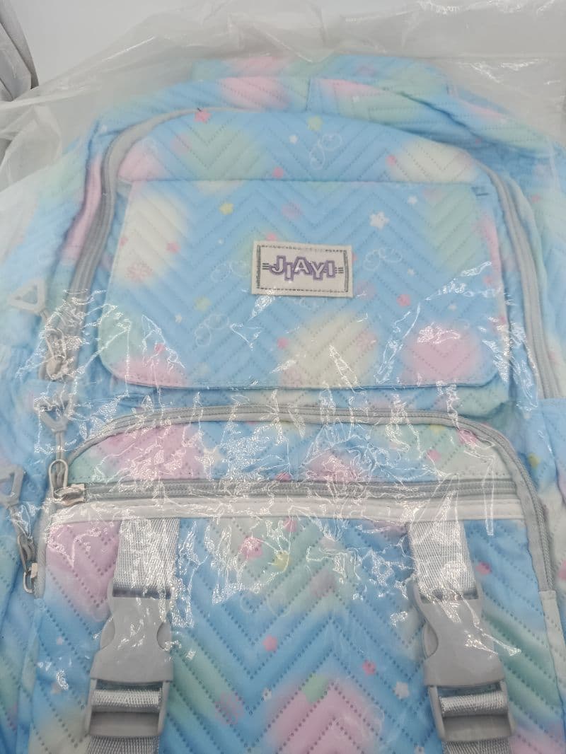 Mochila escolar Jiayi azul pastel con estampado de corazones