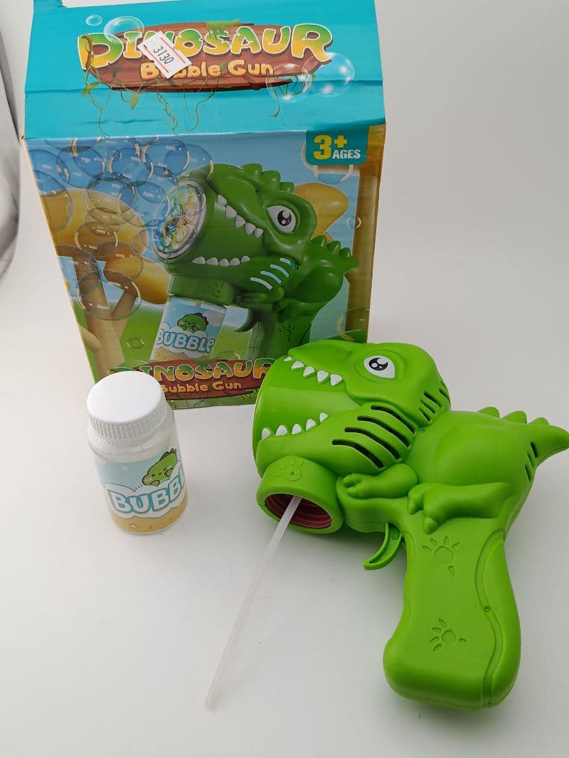 Pistola de burbujas con diseño de dinosaurio