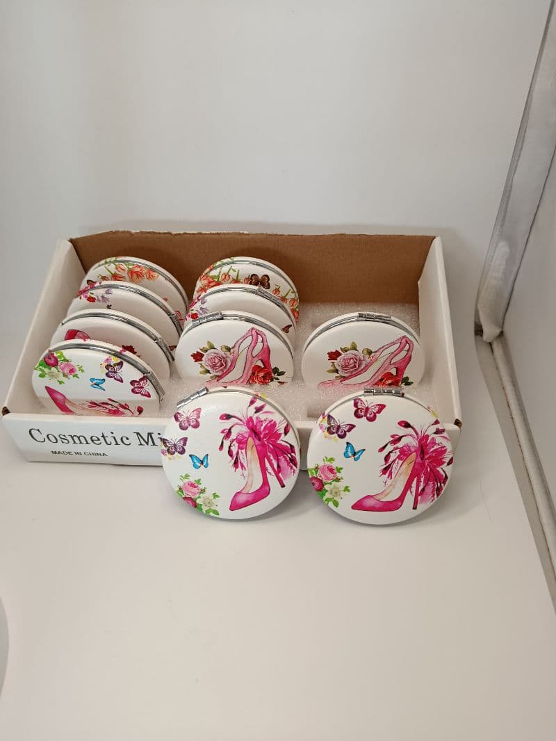Espejo de bolsillo redondo con diseños