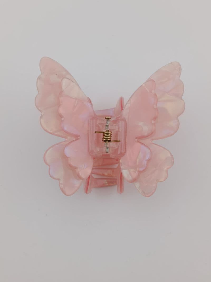 Piraña para cabello forma mariposa rosada