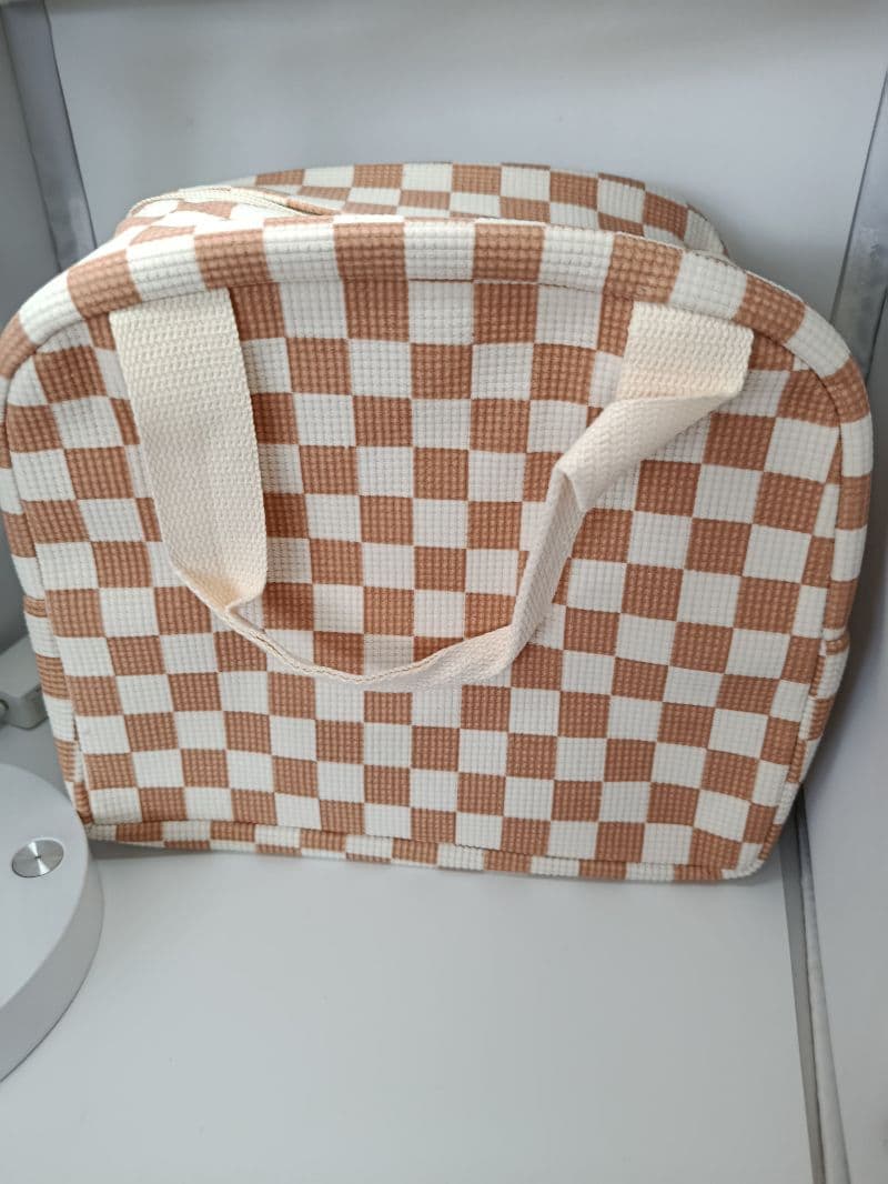 Lonchera de tela con diseño cuadriculado